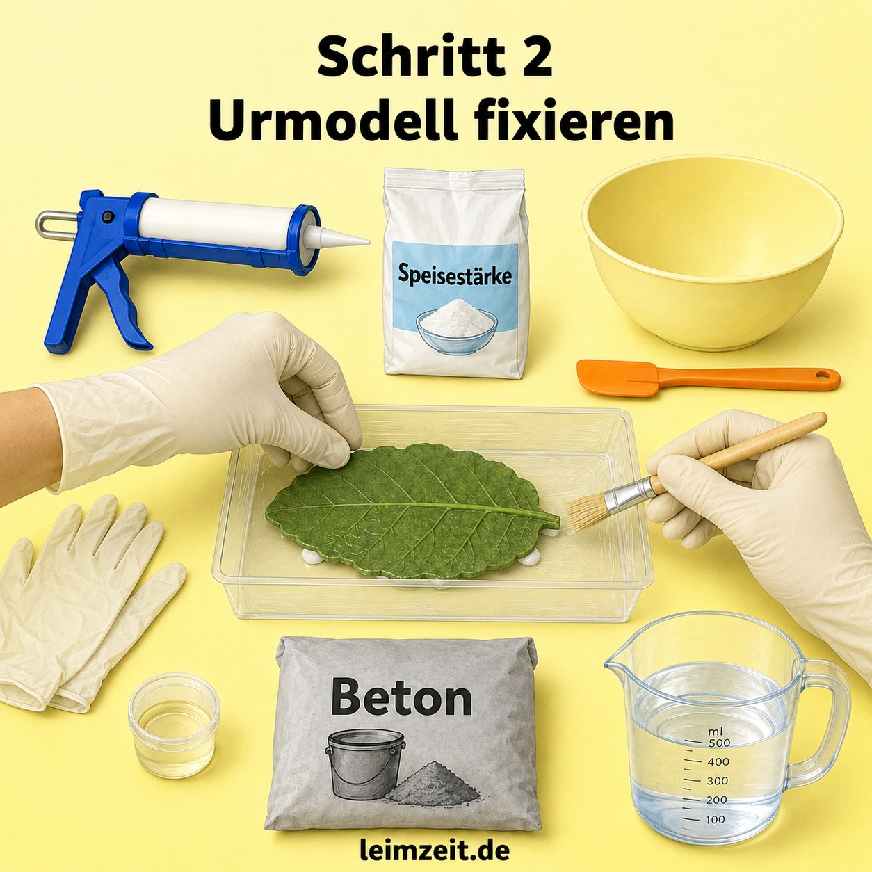 Ein Blatt als Urmodell wird für die Beton-Silikonform mit Wasser und Silikonpunkten fixiert