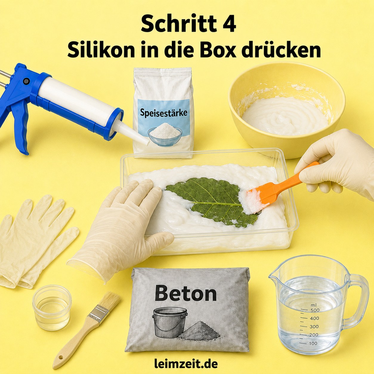Die angerührte Silikonmasse wird von Hand über das Blatt in die Box gedrückt und geglättet