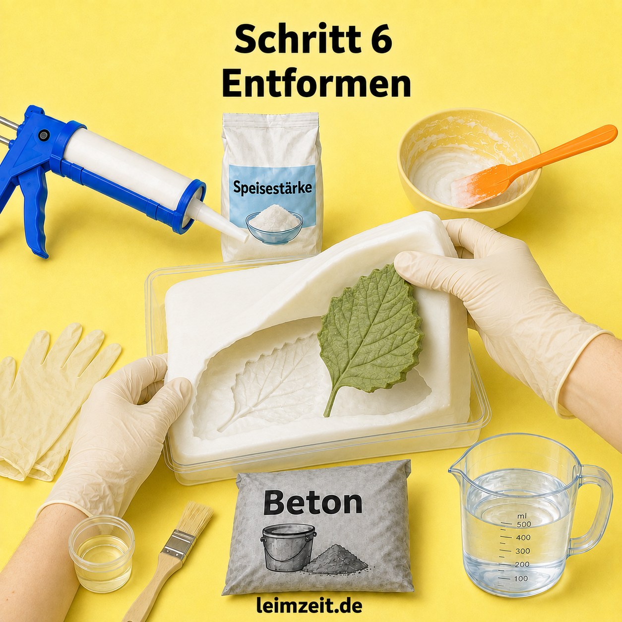 Die ausgehärtete Silikonform wird vorsichtig aus der Box entformt, das Blattmotiv ist deutlich sichtbar